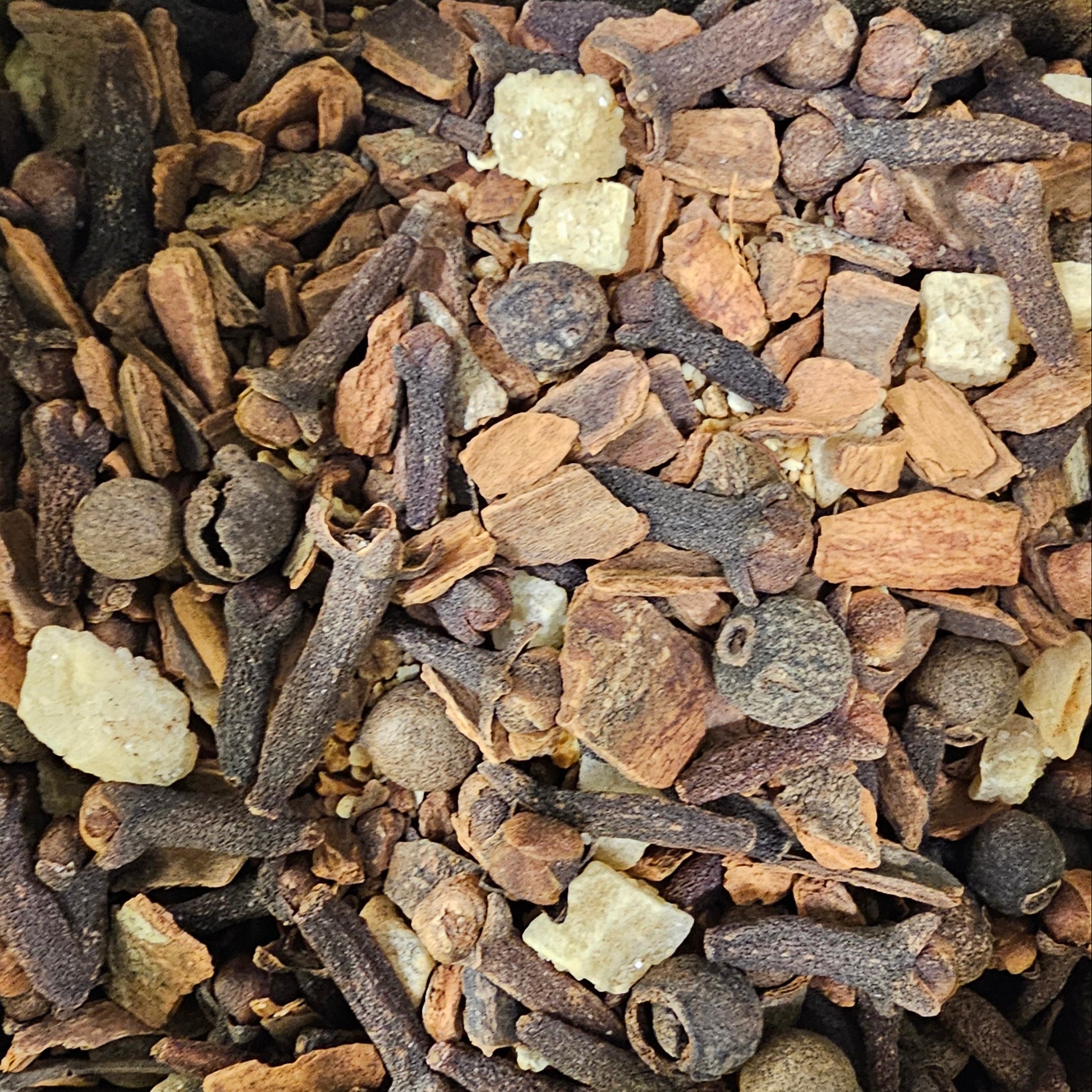 Assorted dried spices in a container